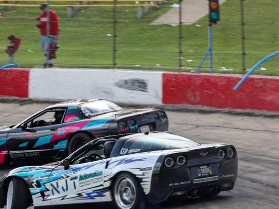 Travis Weiss driving the NJT Automation-sponsored competition drift Corvette on track