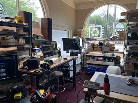 Inside NJT Automation shop in Milwaukee showing industrial automation parts inventory and workspace