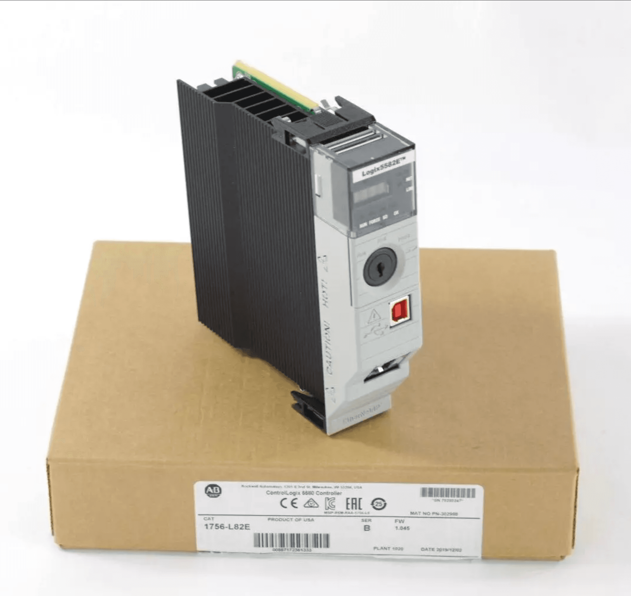 A modern ControlLogix 5580 processor next to legacy platforms in the same plant Allen-Bradley 1756-L82E ControlLogix 5580 processor with its packaging